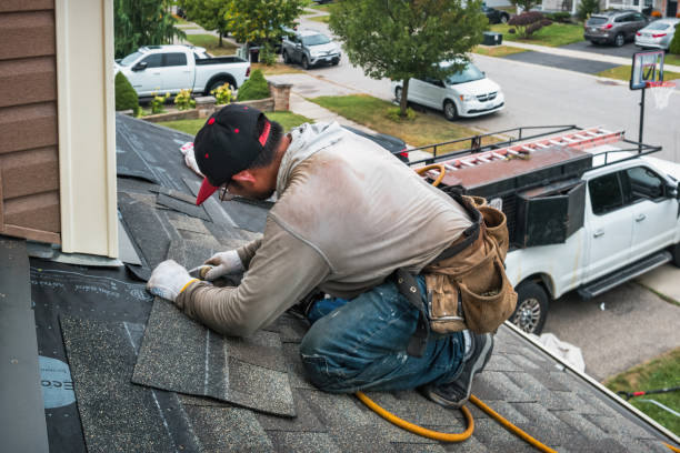 Professional Gutter Repair And Installation technician working in Springfield, MI